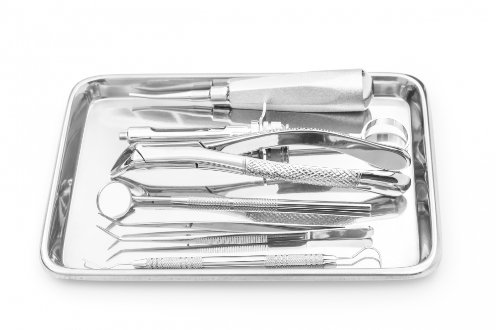 veterinary dental tools and equipment at a tray