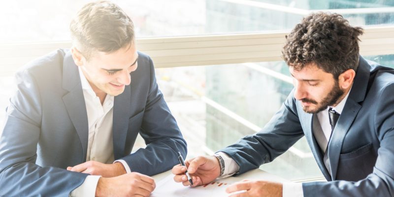 2 men doing business deal